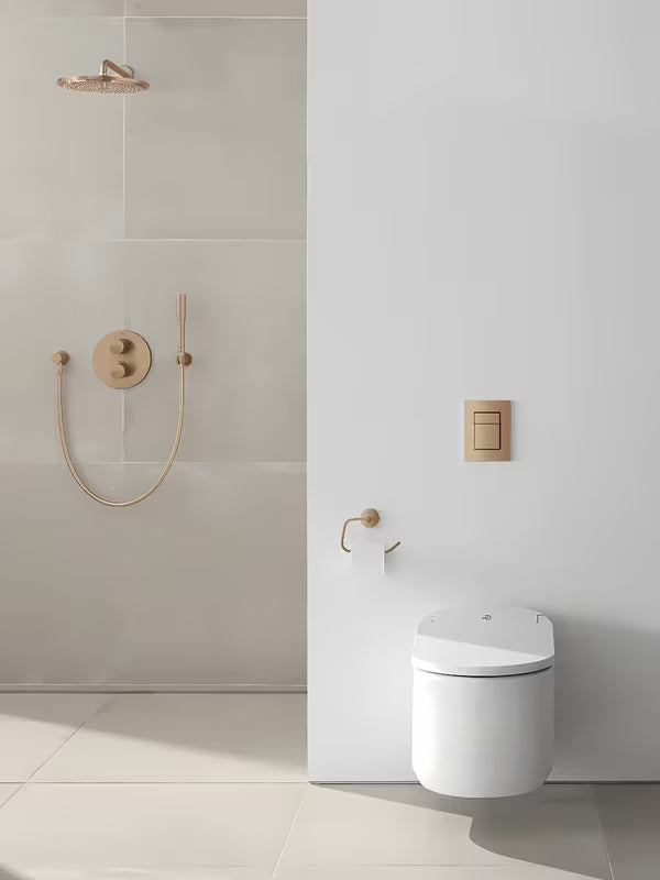 Tualetinio popieriaus laikiklis Grohe Essentials be dangtelio, Brushed Warm Sunset paviršiaus, su paslėptu tvirtinimu.