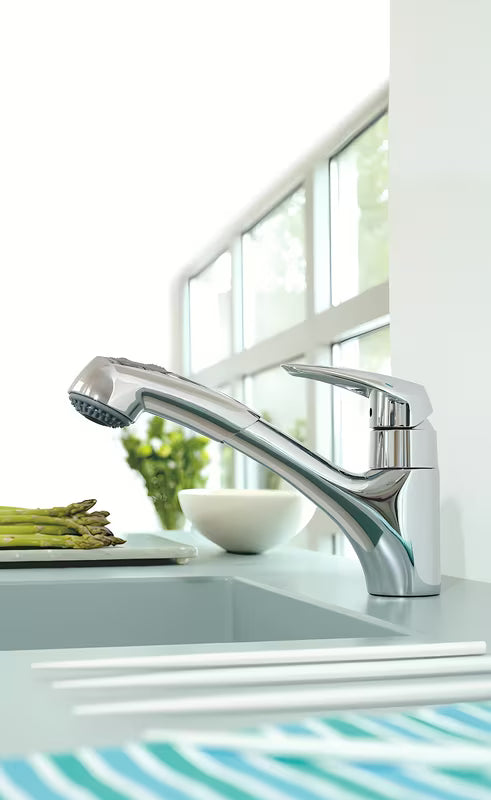 Chromuota virtuvinis maišytuvas Grohe Eurodisc su ištraukiamu dušeliu su pasukamu snapu