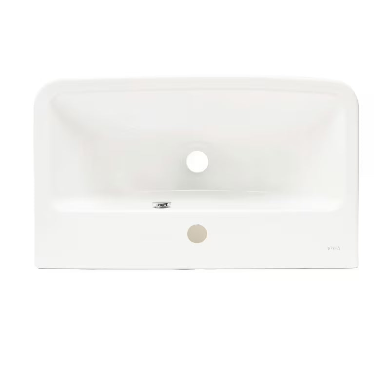 Baltas pakabinamas praustuvas Vitra Integra 60x36 cm, keraminis, su anga pro maišytuvui centre ir persipylimu.