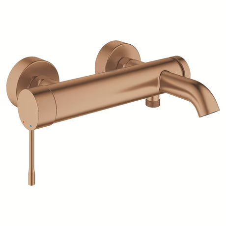 Sieninė vonios maišytuvas Grohe Essence New, apdaila Brushed Warm Sunset su perjungėju, voniai ir dušui.