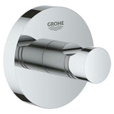 Chromuotas kabliukas chalatui Grohe Essentials su paslėptu tvirtinimu ant apvalios sieninės plokštelės.