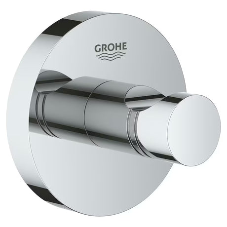 Chromuotas kabliukas chalatui Grohe Essentials su paslėptu tvirtinimu ant apvalios sieninės plokštelės.