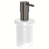 Skysto muilo Dozatorius Grohe Essentials be laikiklio, hard graphite apdaila, stiklinė talpa ir metaliniai elementai.