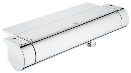 Chromo spalvos termostatinė dušo maišytuvas Grohe Grohtherm 2000 su lentynėle EasyReach pro patogiam valdymui.