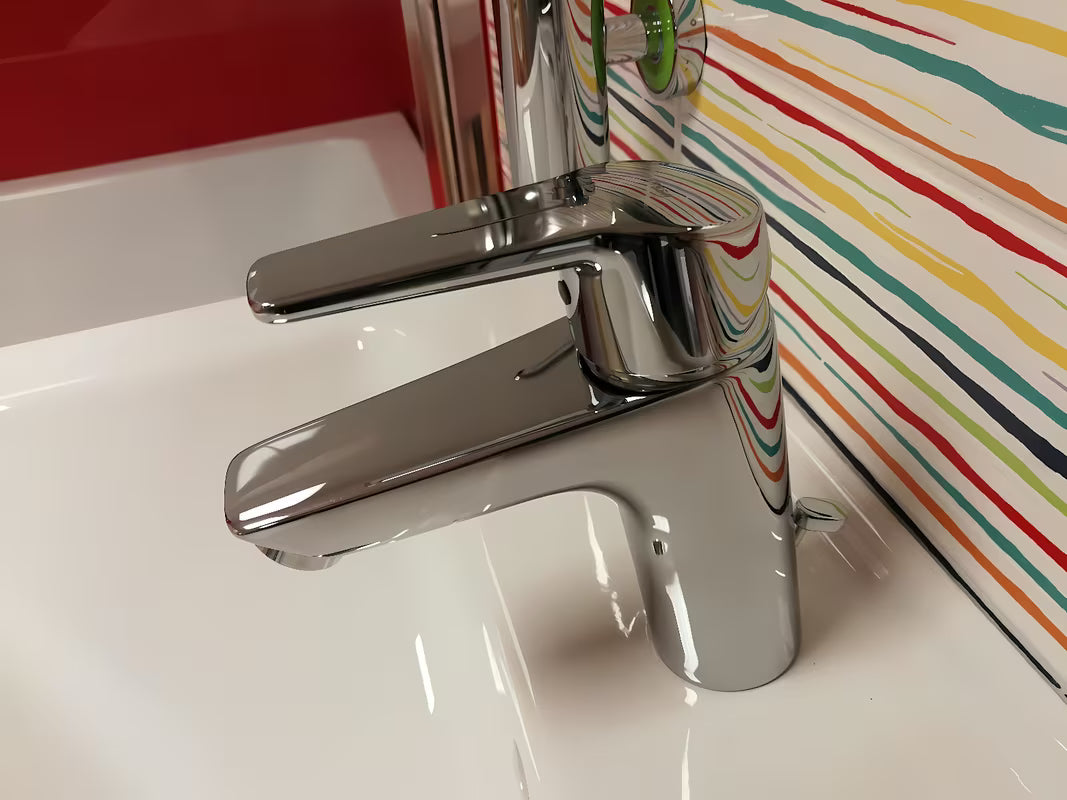Chromo spalvos svirtinis praustuvo maišytuvas Hansa HA224 su šalto paleidimo funkcija ir dugno vožtuvu, apvalaus dizaino.