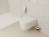 Sieninė WC šepetys hansgrohe addstoris matinės baltos spalvos su laikikliu iš metalo su stikliniu indu.