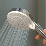Hansgrohe Crometta S dušo sistema chromo spalvos su viršutiniu dušu ir rankiniu dušeliu