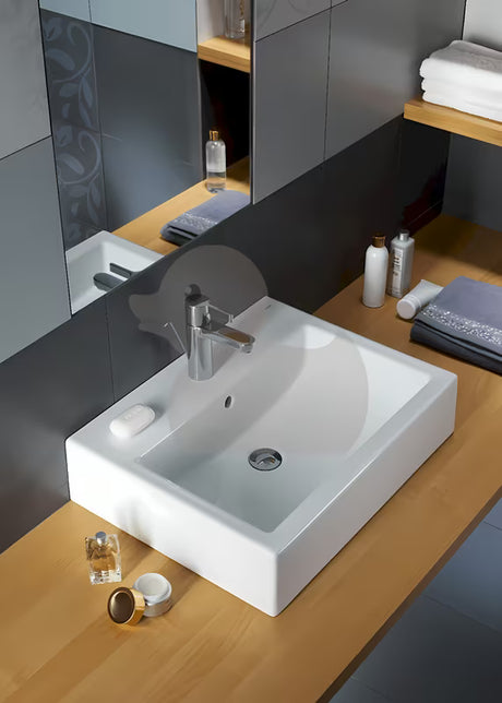 Baltas stačiakampis praustuvas Kolo Twins 60x46 cm su centrine anga pro maišytuvui