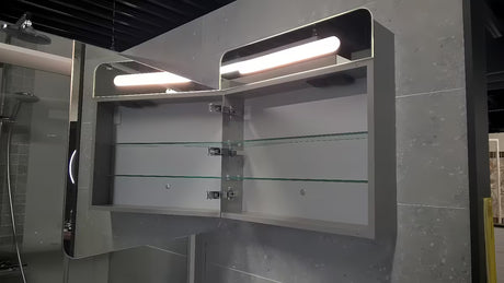 Pilkai sidabrinės spalvos veidrodinė spintelė Naturel 60x65 cm su LED apšvietimu ir su vienomis durelėmis kairėje.