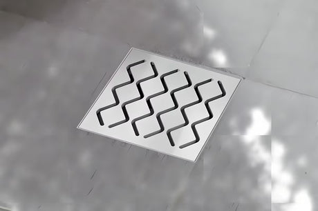 Grindų trapas Ravak SN501 su plastikiniu korpusu ir nerūdijančio plieno grotelėmis, skersmuo 10,5 cm.