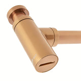 Žalvarinis praustuvo sifonas SAT Aurum, rose gold spalvos, apvalaus dizaino, 32 mm skersmens.