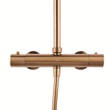 Dušo sistema SAT Aurum su termostatiniu maišytuvu rose gold brushed apdailos, su viršutiniu ir rankiniu dušu.