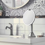 Kosmetinis veidrodėlis Simplehuman Dual Touch iš šlifuoto nerūdijančiojo plieno su Tru-lux LED apšvietimu ir 5x didinimu.