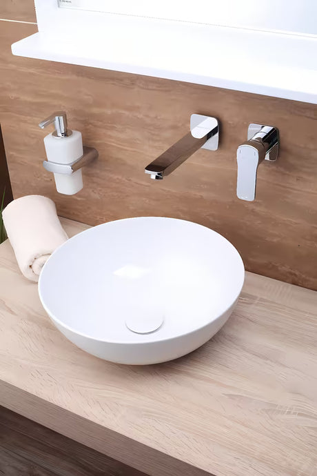 Balta pastatomas ant stalviršio praustuvas Triomini Slim 38,5 x 38,5 cm iš plonasienės keramikos