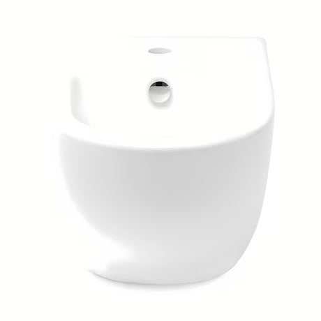 Baltas pakabinamas bidė vitra Shift su paslėptu keramikos tvirtinimu, be matomų dangtelių ir angų.